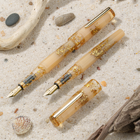 BENU Euphoria Golden Beach fountain pen in faceted amber resin with golden foil and gold clip