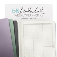 Wonderland222 B6 undated planner open, shown with all three cover colors